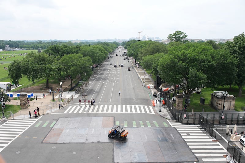 WASHINGTON, DC - JUNE 14: Metal plates cover part of the 15th Street NW and Constitution Avenue intersection prior to the start of a parade and celebration marking the 250th birthday of the U.S. Army June 14, 2025 in Washington, DC. The U.S. Army is marking its 250th birthday with a military parade including roughly 6,600 troops, 150 vehicles, and over 50 aircraft. The parade, which coincides with President Donald Trump's 79th birthday, is designed to tell the history of the Army. (Photo by Kevin Dietsch/Getty Images)