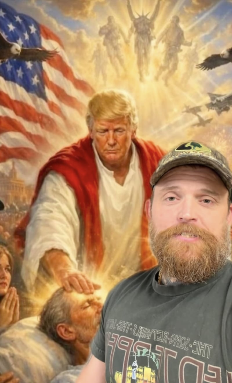 Vlogger and country rapper Adam Calhoun filming himself in front of a green screen image of Donald Trump as Christ.