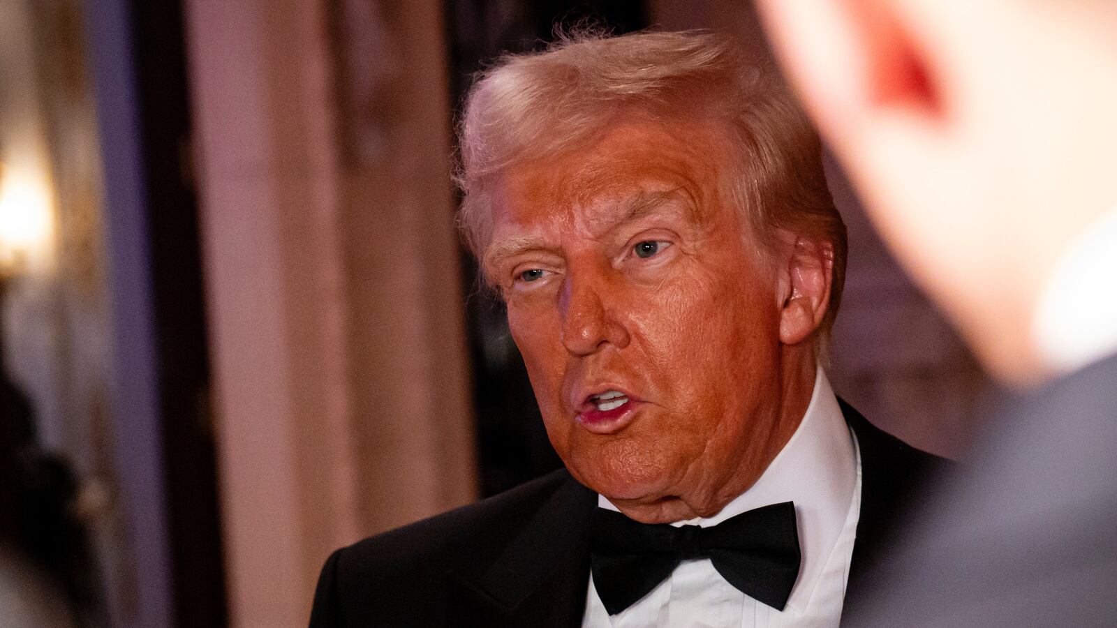 Donald Trump arrives to deliver remarks on New Year's Eve at his Mar-A-Lago Club on December 31, 2024 in Palm Beach, Florida.