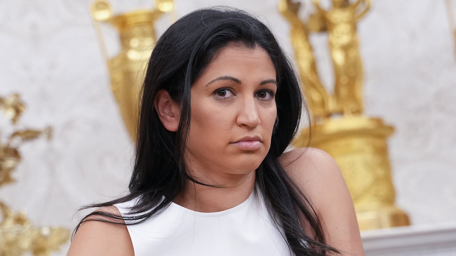 WASHINGTON, DC - MAY 30: White House Deputy Chief of Staff Stephen Miller's wife, Katie Miller, listens as U.S. President Donald Trump and Tesla CEO Elon Musk speak to reporters in the Oval Office of the White House on May 30, 2025 in Washington, DC. Musk, who served as an adviser to Trump and led the Department of Government Efficiency, announced he would leave his role in the Trump administration to refocus on his businesses. (Photo by Kevin Dietsch/Getty Images)