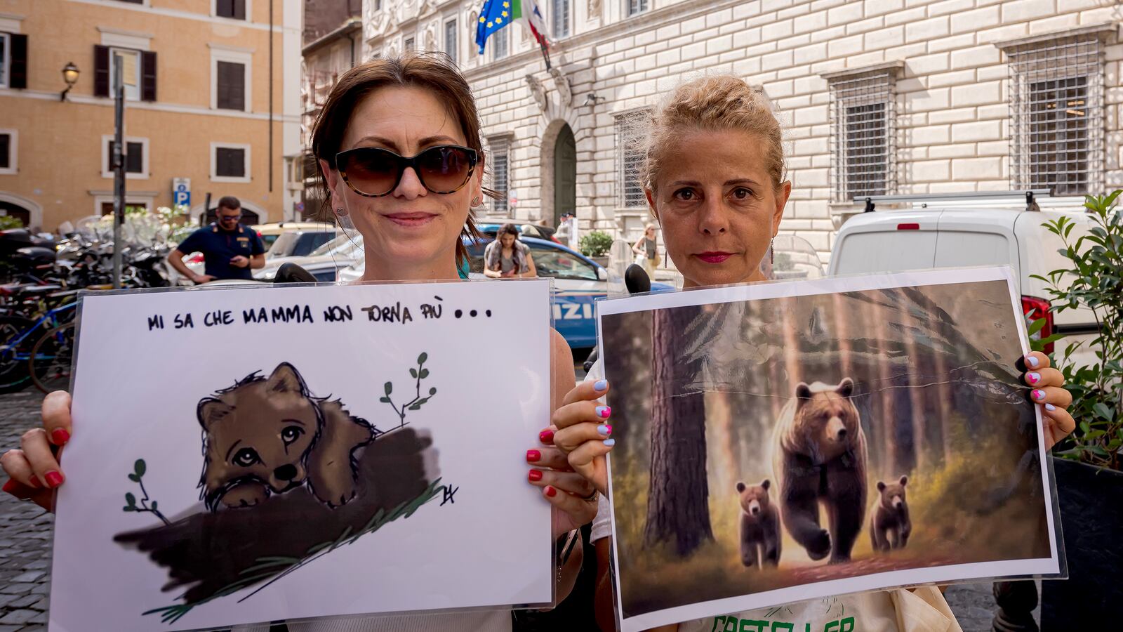 Animal rights activists demonstrate in front of the State Council in Italy. A top court in Rome ruled against a slaughter order for two killer bears.