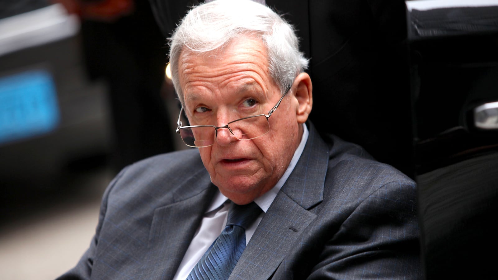 Former House Speaker Dennis Hastert leaves the Dirksen Federal Court House in a wheelchair after his sentencing on April 27, 2016 in Chicago, Illinois.