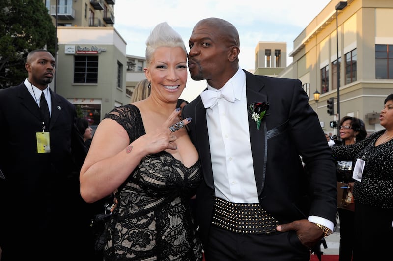 Actor Terry Crews and wife Rebecca King-Crews attend the 45th NAACP Image Awards presented by TV One at Pasadena Civic Auditorium on February 22, 2014 in Pasadena, California.