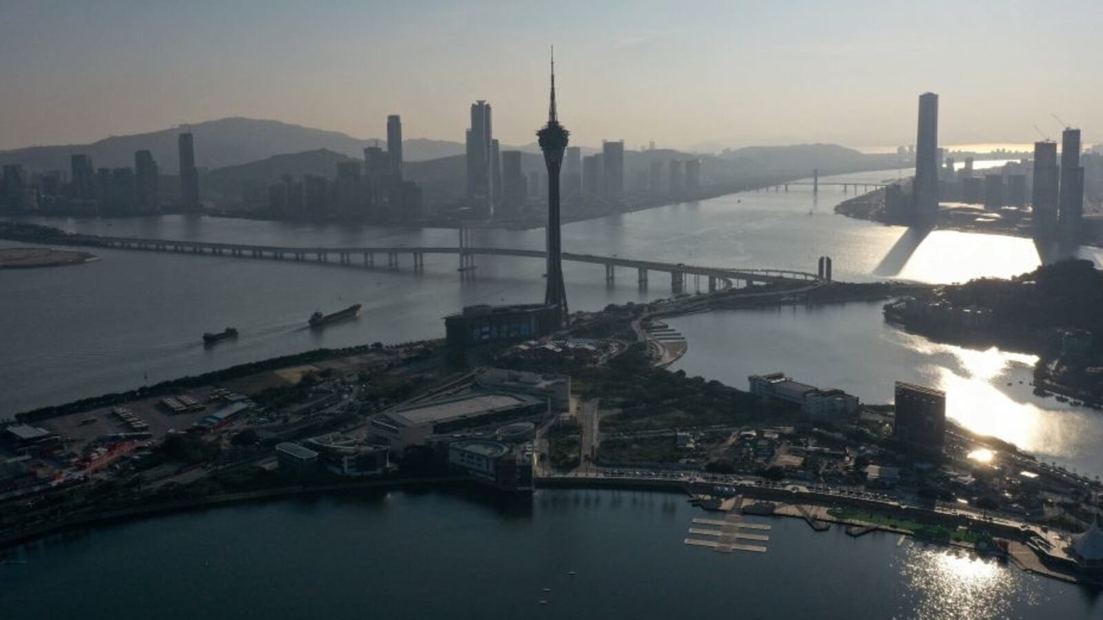 This photo taken on January 18, 2023 shows an aerial view of the Macau Tower (C) in the southern Chinese enclave of Macau.
