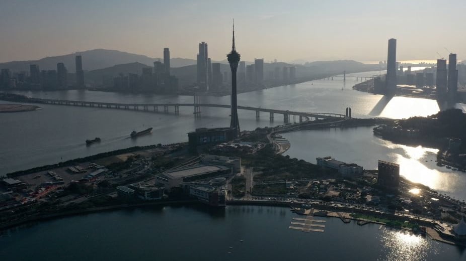 This photo taken on January 18, 2023 shows an aerial view of the Macau Tower (C) in the southern Chinese enclave of Macau.