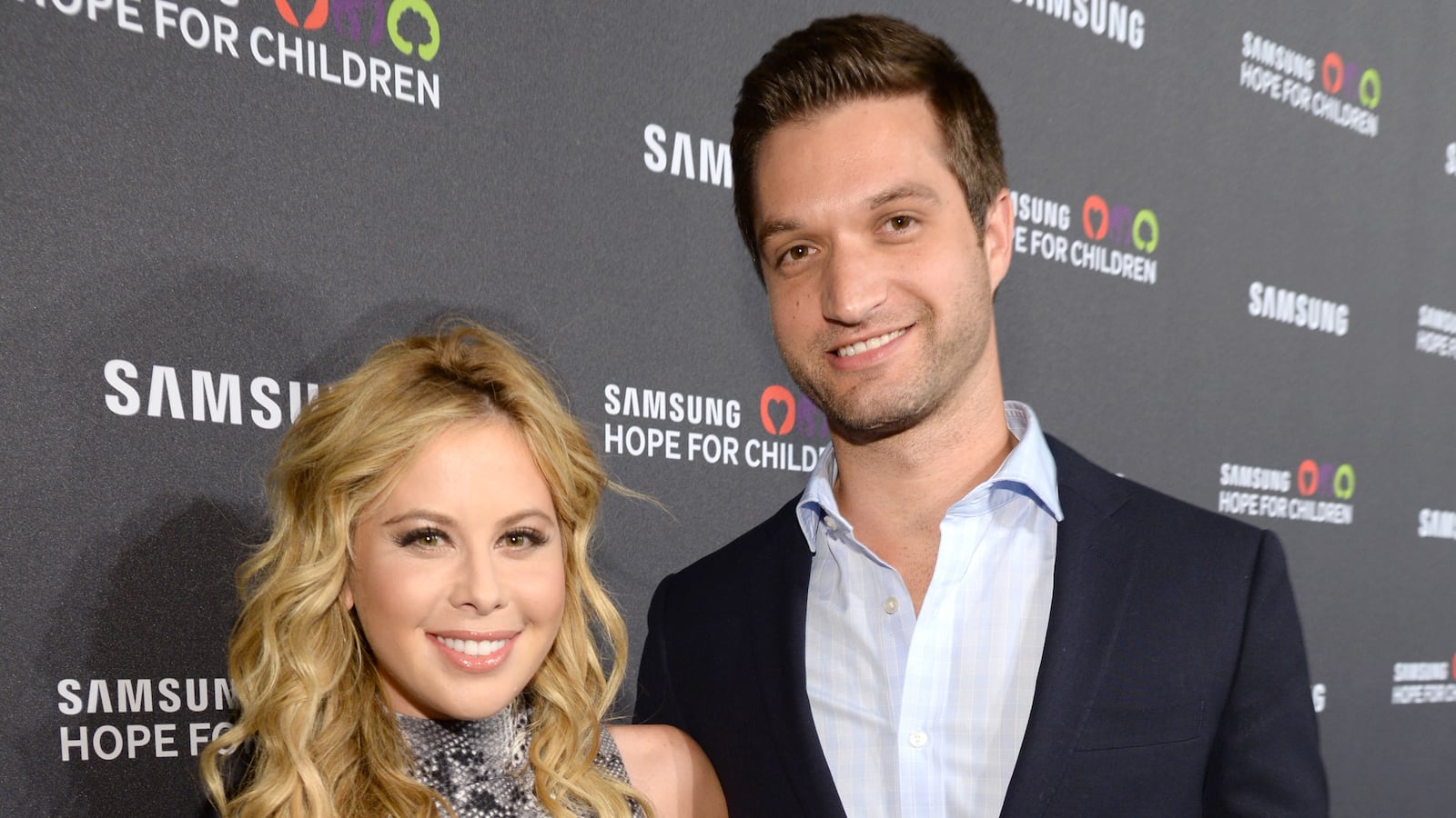 Tara Lipinski (L) and Todd Kapostasy