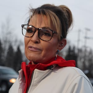 Sarah Palin speaks to the media as she campaigns with supporters on November 08, 2022 in Anchorage, Alaska.
