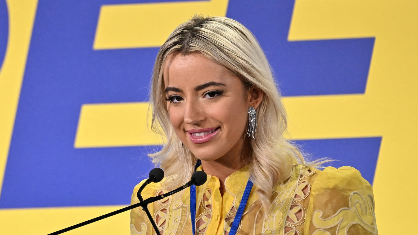 US author Ashley St. Clair, delivers a speech during a convention of the European Parliament leaders of Identity and Democracy group (ID), on December 3, 2023 at the Fortezza da Basso in Florence. The convention organized by Italian deputy Prime Minister Matteo Salvini launches the Northern League campaign for the European elections. ID group has MEPs from eight countries, with the majority coming from Italy's Lega party, the Rassemblement National in France and Germany's AfD. (Photo by Andreas SOLARO / AFP) (Photo by ANDREAS SOLARO/AFP via Getty Images)