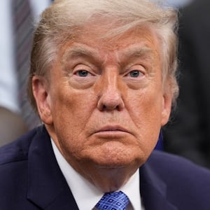 U.S. President Donald Trump looks on as he sits in the Oval Office of the White House in Washington, D.C., U.S., June 26, 2026. REUTERS/Ken Cedeno