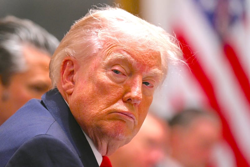 President Donald Trump listens during a cabinet meeting in the Cabinet Room of the White House in Washington, DC, on January 29, 2026.
