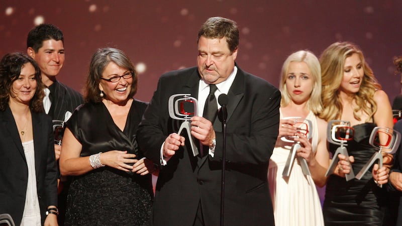 cheats/2017/04/28/roseanne-reboot-to-reunited-roseanne-barr-john-goodman-and-more/170428-roseanne-reboot-cheat_ru9eab