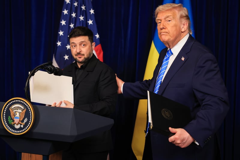 President Donald Trump and Ukrainian President Volodymyr Zelensky leave a press conference following their meeting at Trump’s Mar-a-Lago club on December 28, 2025 in Palm Beach, Florida.