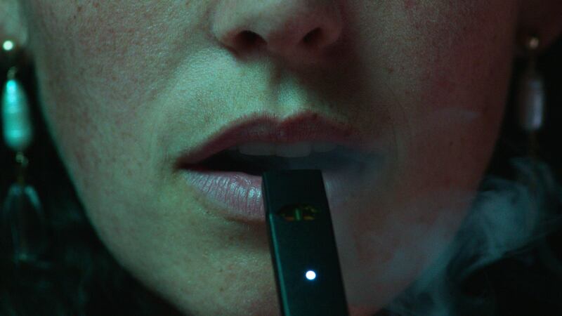A photo including a film still from the Big Vape: The Rise and Fall of Juul docuseries on Netflix