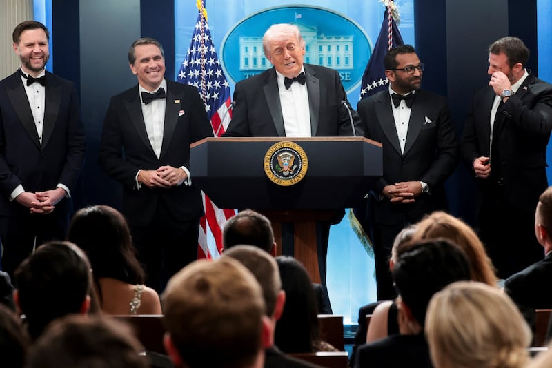 President Donald Trump speaks next to Federal Bureau of Investigation (FBI) Director Kash Patel, acting Attorney General Todd Blanche, Vice President JD Vance and Homeland Security Secretary Markwayne Mullin at a press briefing at the White House, following a shooting incident during the annual White House Correspondents’ Association dinner, in Washington, D.C., U.S., April 25, 2026