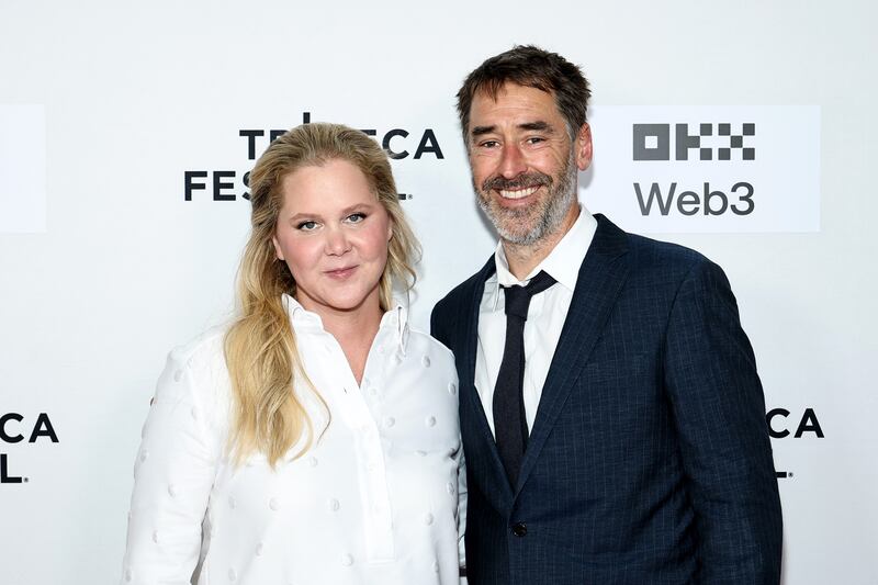 Amy Schumer and Chris Fischer