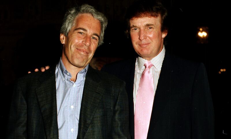 Jeffrey Epstein (left) and Donald Trump at Mar-a-Lago in 1997.
