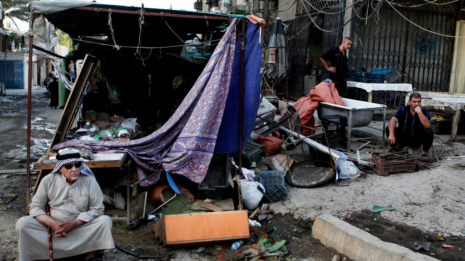 cheats/2013/07/21/dozens-dead-in-baghdad-bombings/132107-bombs-over-Baghdad-cheat_wdalso