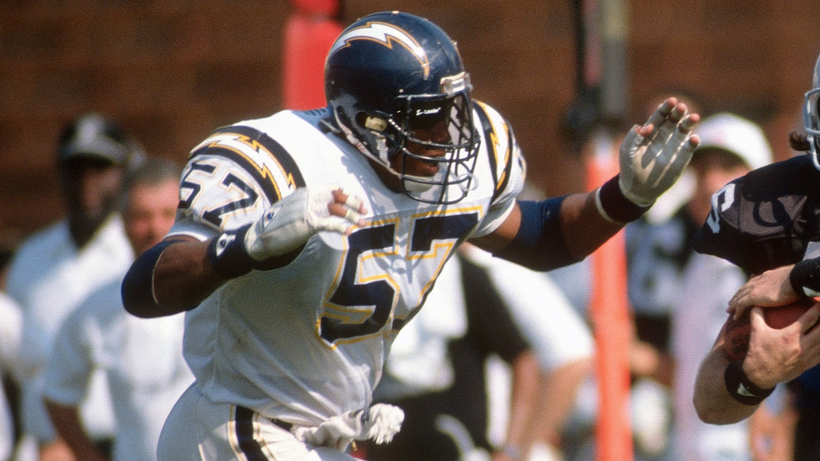 Todd Christensen #46 of the Los Angeles Raiders catches a pass over Keith Browner #57 of the San Diego Chargers during an NFL football game September 4, 1988 at the Los Angeles Memorial Coliseum in Los Angeles, California. Christensen played for the Raiders from 1979-88.
