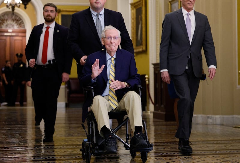 Senator Mitch McConnell waves at reporters outside the Senate Chamber after he returned to Capitol Hill  on September 14, 2026 for the first time in more than three months.
