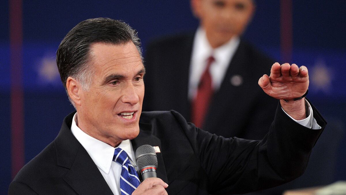 articles/2012/10/17/michelle-goldberg-on-the-gop-s-delusional-debate-night/romney-gestures-down_h0n1kq