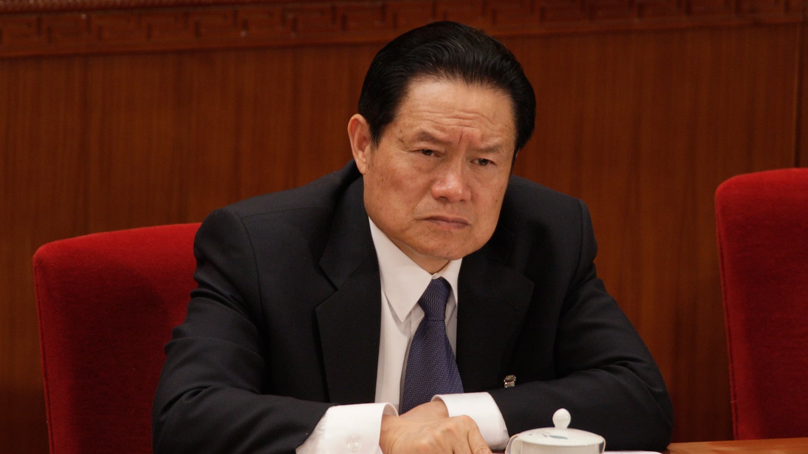 articles/2013/12/12/china-s-corruption-purge-the-fall-of-zhou-yongkang/131212-huang-zhou-yongkang_ng3qyx