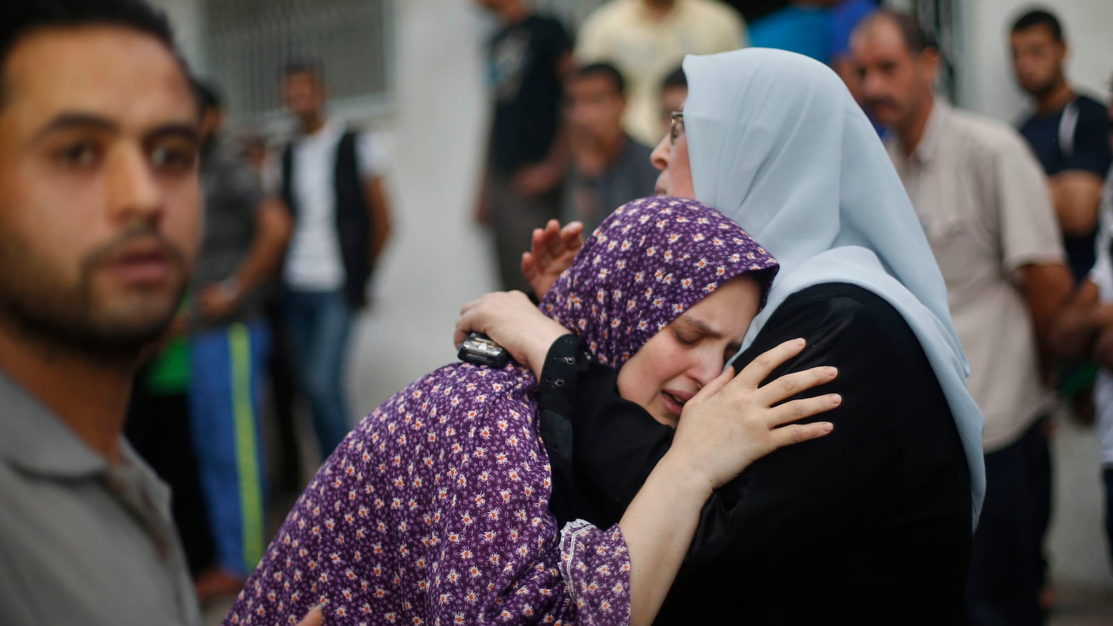 articles/2014/07/18/a-child-s-funeral-in-gaza/140718-rosenfeld-funeral-tease_warppu