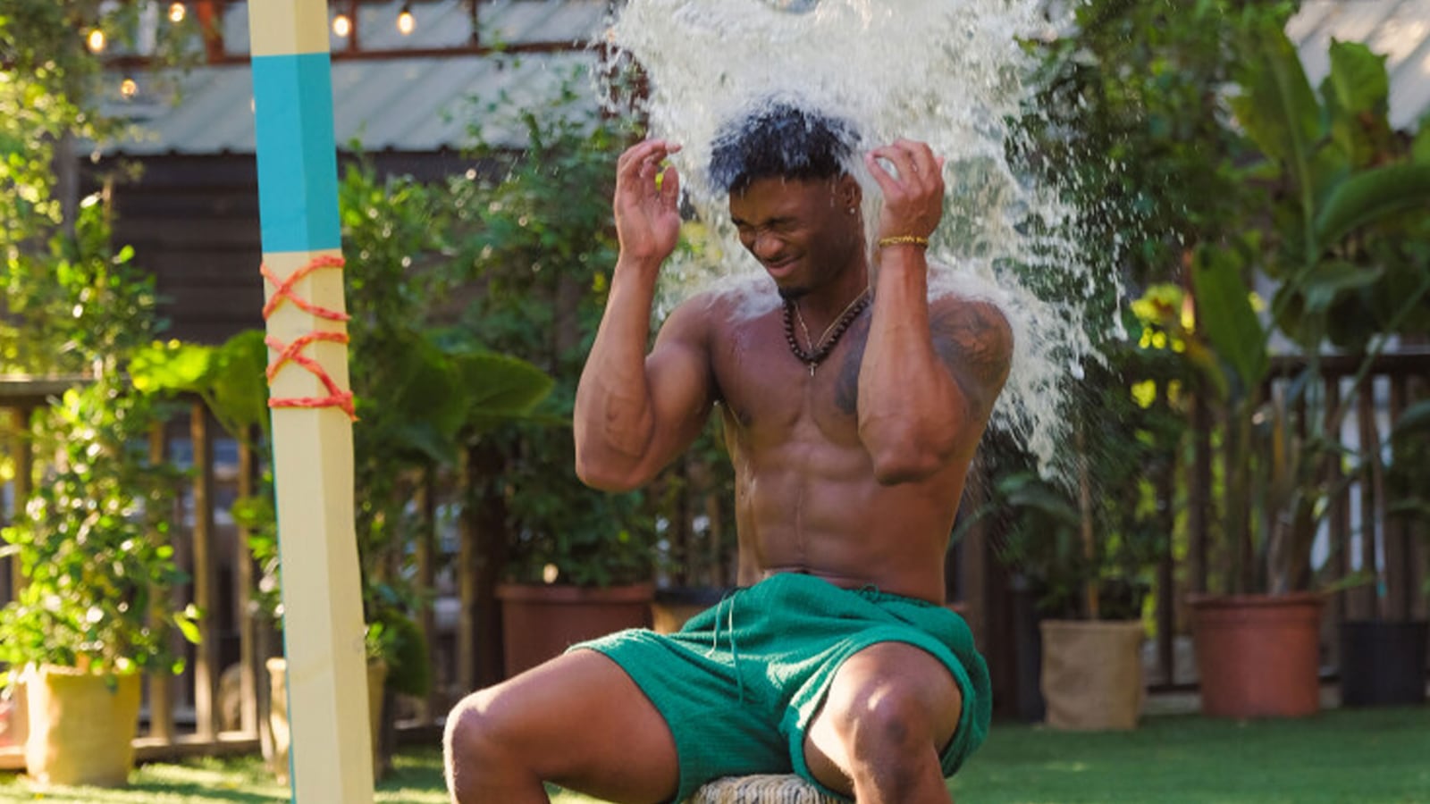 A contestant getting dunked on F Boy Island