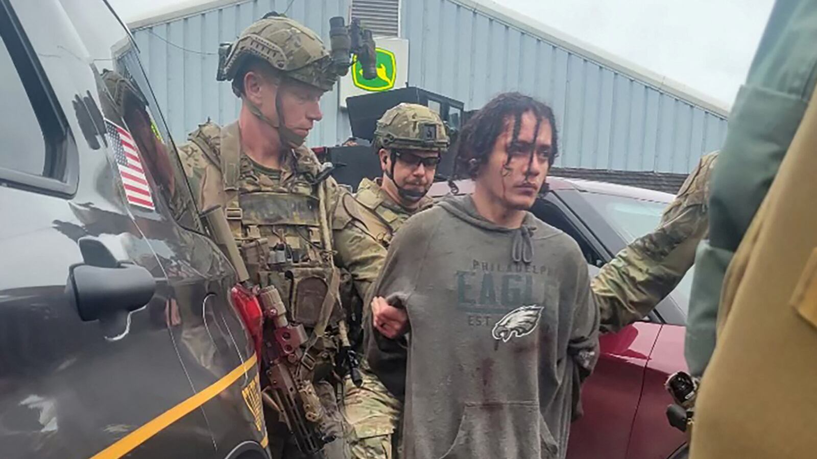 Escaped fugitive Danelo Cavalcante, 34, a Brazilian who escaped from Chester County Prison where he was awaiting transfer to a state prison to serve a life sentence for killing his ex-girlfriend, is taken into custody by law enforcement