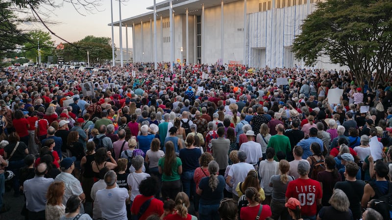 A mass of demonstrators gather outside the Kennedy Center to protest Donald Trump's destructive plans for the institution.