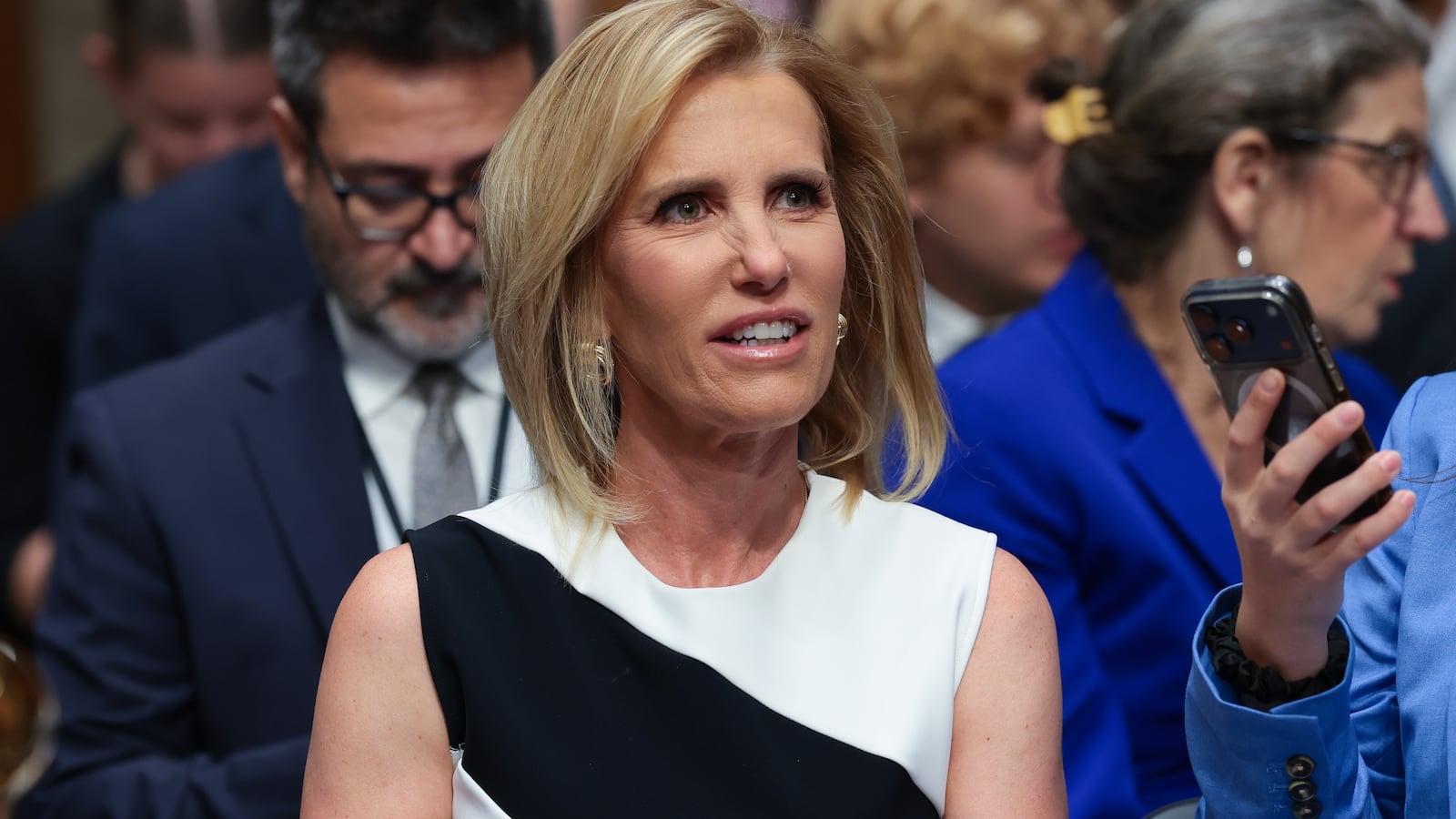 Fox News host Laura Ingraham watches from the audience as former NIH Director Anthony Fauci testifies before the Senate Homeland Security and Governmental Affairs Committee hearing on July 29, 2026 in Washington, DC.