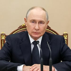 Russian President Vladimir Putin chairs a meeting