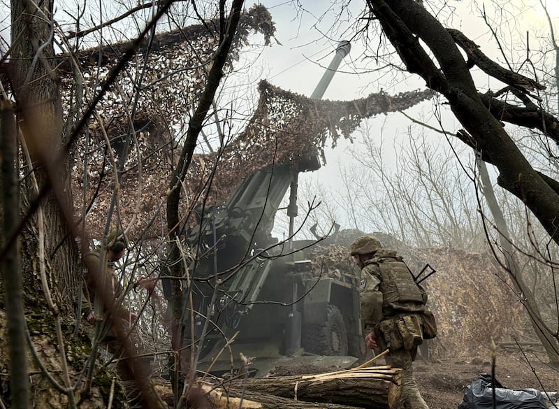 FILE PHOTO: An artilleryman of the 147th Airborne Assault Brigade of the Armed Forces of Ukraine fires a self-propelled howitzer towards Russian troops at a position on the front line, amid Russia's attack on Ukraine, near the frontline town of Pokrovsk in Donetsk region, Ukraine March 30, 2026. Picture taken with a mobile phone. REUTERS/Stringer/File Photo