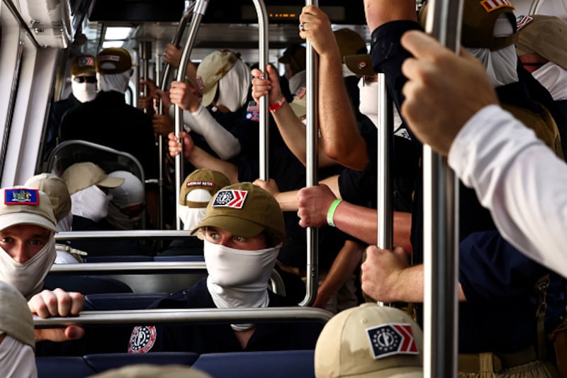 Members of the white supremacist group Patriot Front ride the Washington Metro