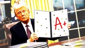 Donald Trump holding up a bifold paper with "A+" and gold stars on it