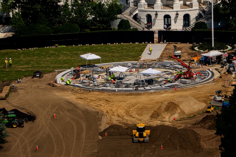 Construction continues on a new helipad on the South Lawn of the White House and the East Wing ballroom on August 24, 2026, in Washington, DC. The Supreme Court has temporarily cleared the way for construction of Trump's White House ballroom to continue while the justices consider whether the administration had the authority to undertake the massive project without congressional approval. (Photo by Andrew Harnik/Getty Images)