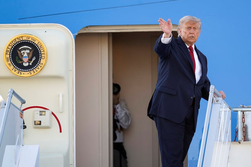 U.S. President Donald Trump gestures as he boards Air Force One at Geneva Airport following the G7 summit in nearby Evian (France), in Geneva, Switzerland, June 17, 2026. Martial Trezzini/Pool via REUTERS