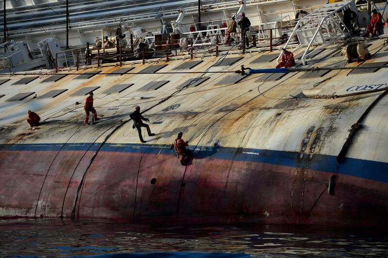 articles/2013/01/13/risky-rescue-a-year-after-it-sank-raising-the-costa-concordia/130113-nadeau-costa-salvage-embed2_aafg1v