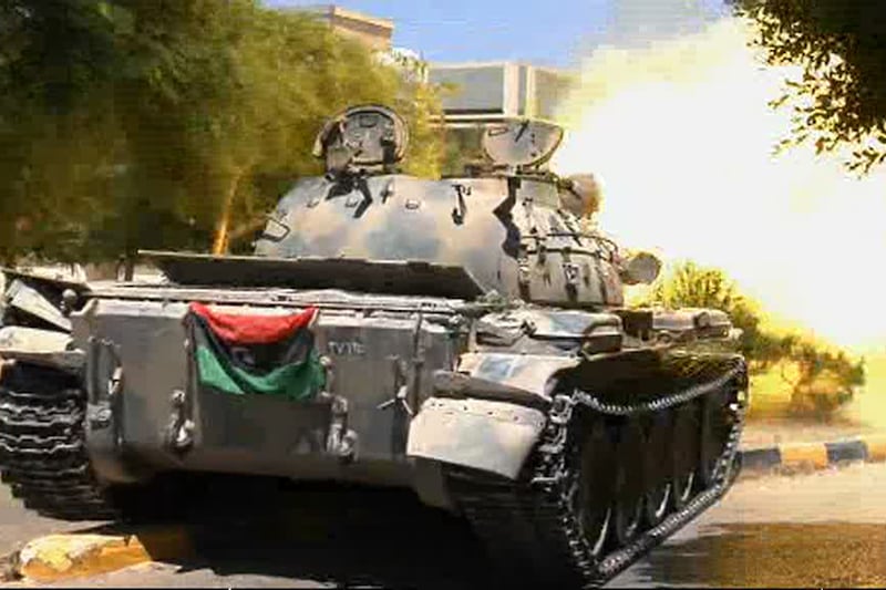 galleries/2011/08/21/libya-rebels-take-tripoli-capture-gaddafi-sons-photos/libyan-rebels6_hg48qx