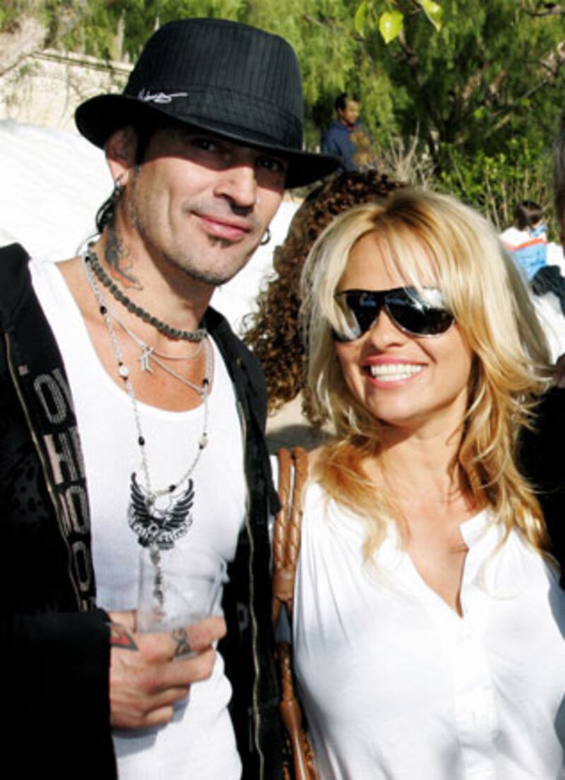 galleries/2009/12/08/will-you-remarry-me/celeb-remarriages---andersonlee_qtx17c