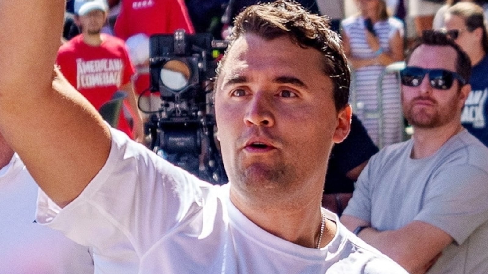 Right-wing activist and commentator Charlie Kirk throws hats to the crowd shortly before he was shot at a Utah Valley University speaking event in Orem, Utah, Sept. 10, 2025.