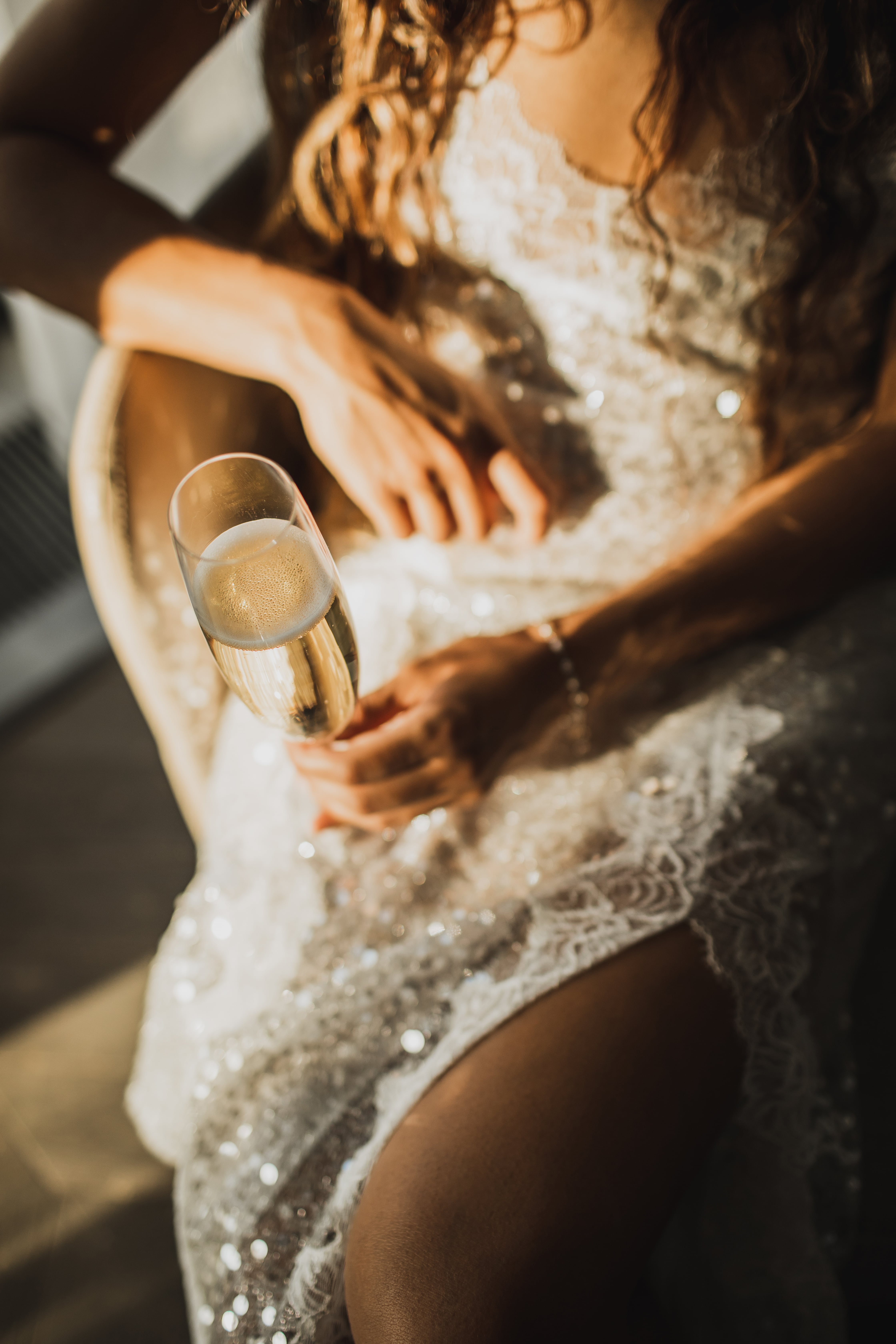 Woman enjoying cold sparkling wine.