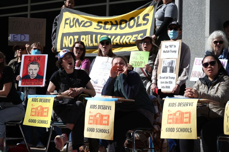 Protestors participate in the “Rally to Defend Our Schools” in front of the U.S. Department of Education on March 21, 2025 in Washington, DC.