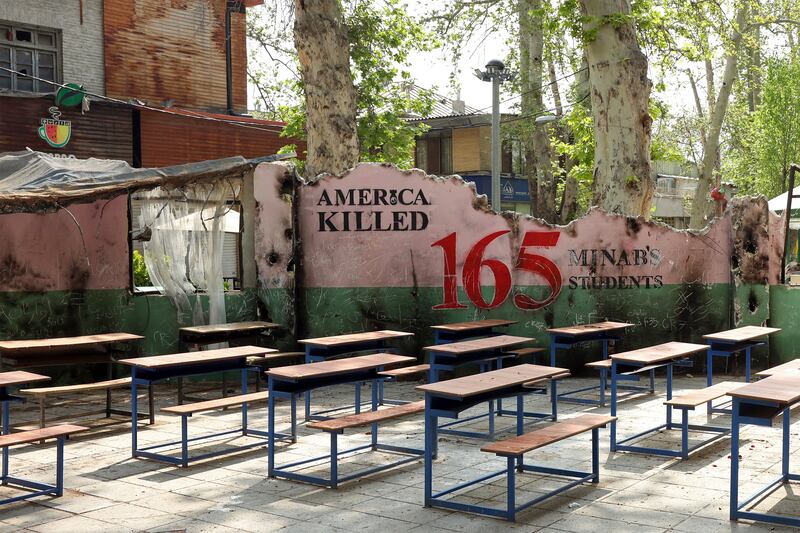 A memorial depicting a symbolic classroom representing the Minab school children