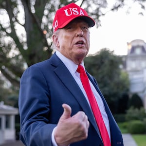 WASHINGTON, DC - OCTOBER 05: U.S. President Donald Trump talks to the media after walking off Marine One on the South Lawn of the White House on October 05, 2025 in Washington, DC. Trump was returning from a celebration of the Navy’s 250th anniversary in Norfolk, Virginia. (Photo by Tasos Katopodis/Getty Images)