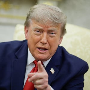 U.S. President Donald Trump points his finger as he participates in a bilateral meeting with Iraqi Prime Minister Ali al-Zaidi (not pictured) in the Oval Office at the White House in Washington, D.C., U.S., July 14, 2026. REUTERS/Evan Vucci