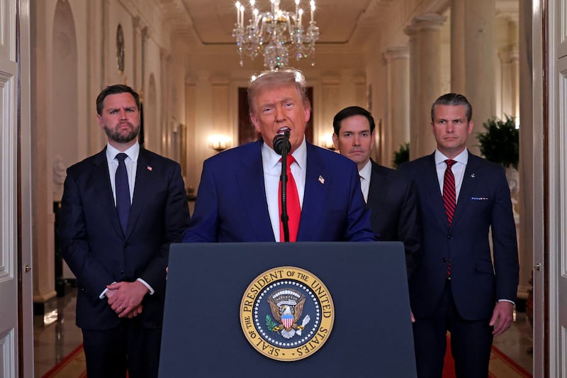 TOPSHOT - US President Donald Trump addresses the nation, alongside US Vice President JD Vance (L), US Secretary of State Marco Rubio (2nd R) and US Secretary of Defense Pete Hegseth (R), from the White House in Washington, DC on June 21, 2025, following the announcement that the US bombed nuclear sites in Iran. President Donald Trump said June 21, 2025 the US military has carried out a "very successful attack" on three Iranian nuclear sites, including the underground uranium enrichment facility at Fordo. "We have completed our very successful attack on the three Nuclear sites in Iran, including Fordow, Natanz, and Esfahan," Trump said in a post on his Truth Social platform. (Photo by CARLOS BARRIA / POOL / AFP) (Photo by CARLOS BARRIA/POOL/AFP via Getty Images)