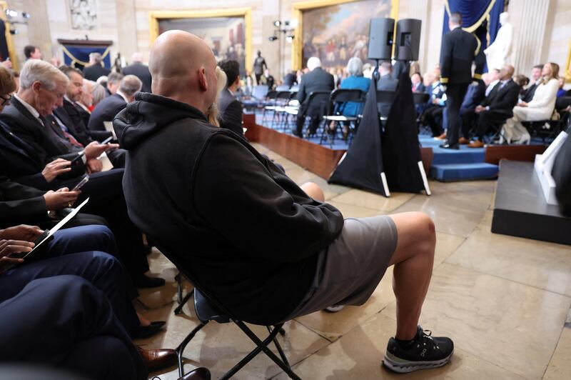 U.S. Senator John Fetterman (D-PA) sits ahead of the Presidential Inauguration of Donald Trump at the Rotunda of the U.S. Capitol in Washington, U.S., January 20, 2025. REUTERS/Kevin Lamarque/Pool