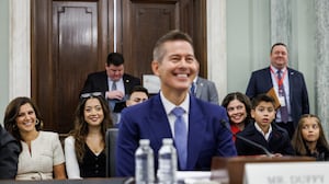 WASHINGTON, DC - JANUARY 15: The family of Sean Duffy, U.S. President-elect Donald Trump's nominee for Secretary of Transportation, sits behind him as he testifies before the Senate Commerce, Science, and Transportation Committee during his confirmation hearing in the Russell Senate Office Building on January 15, 2025 in Washington, DC. Duffy, who served three terms as a Republican Representative for Wisconsin, has bipartisan support in the Senate. (Photo by Samuel Corum/Getty Images)