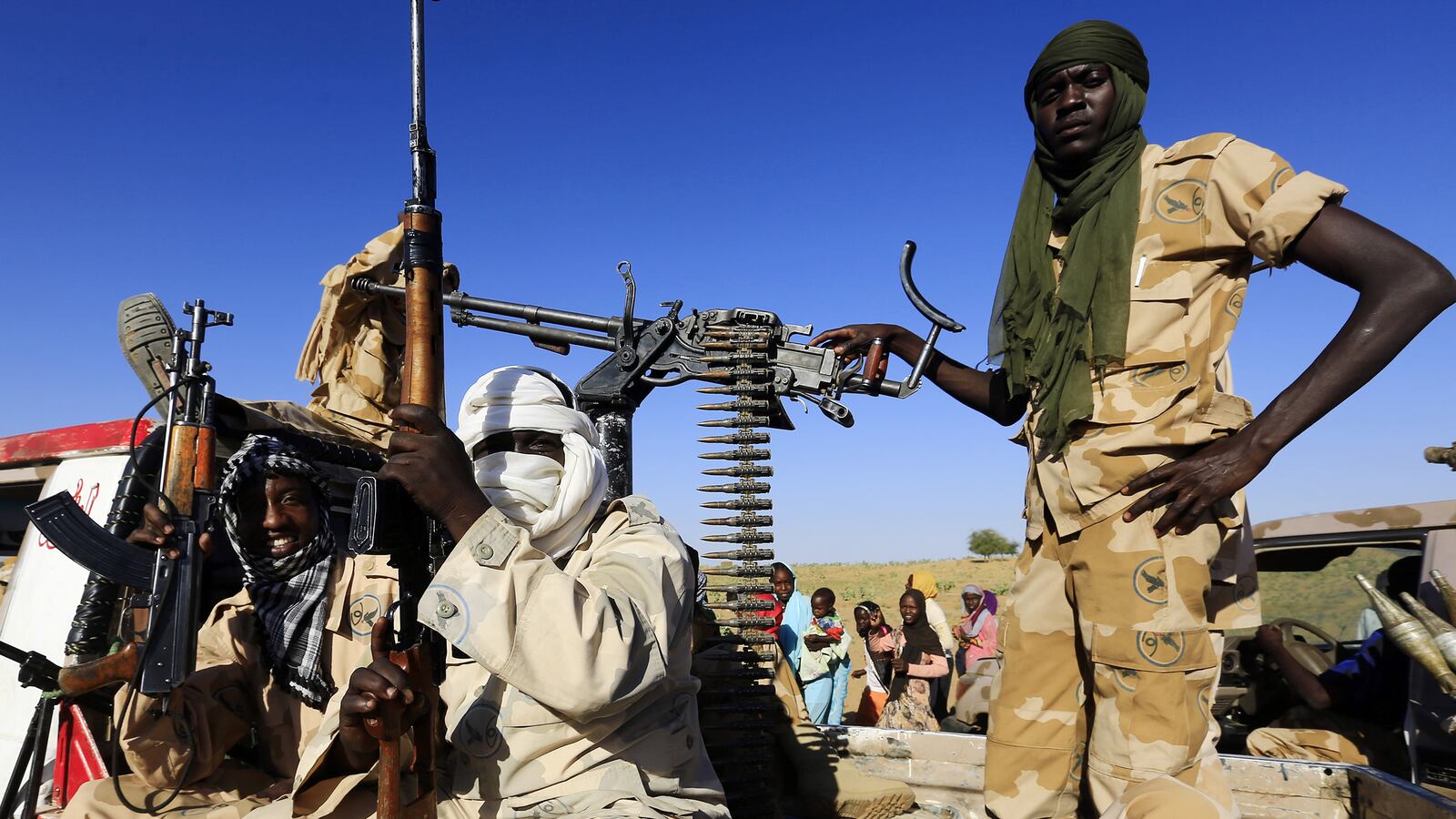 articles/2015/02/12/in-darfur-mass-rape-within-minutes/150211-strochlic-sudan-army-tease_ngbxqw