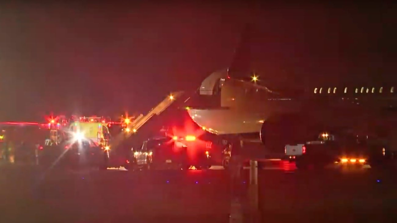 A Delta flight carrying Carolina Panthers players slid off the taxiway at an airport in Charlotte.